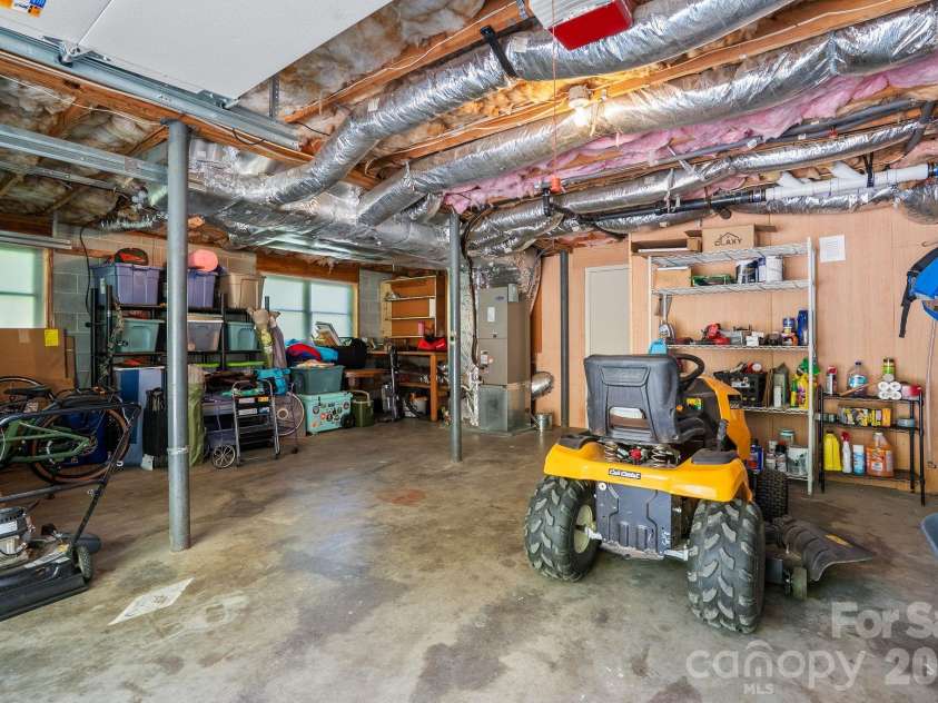 75 High Valley Estates Drive, Alexander, NC 28701.  MLS# CAR4372479, YatesRealty ID 20036. Workshop area