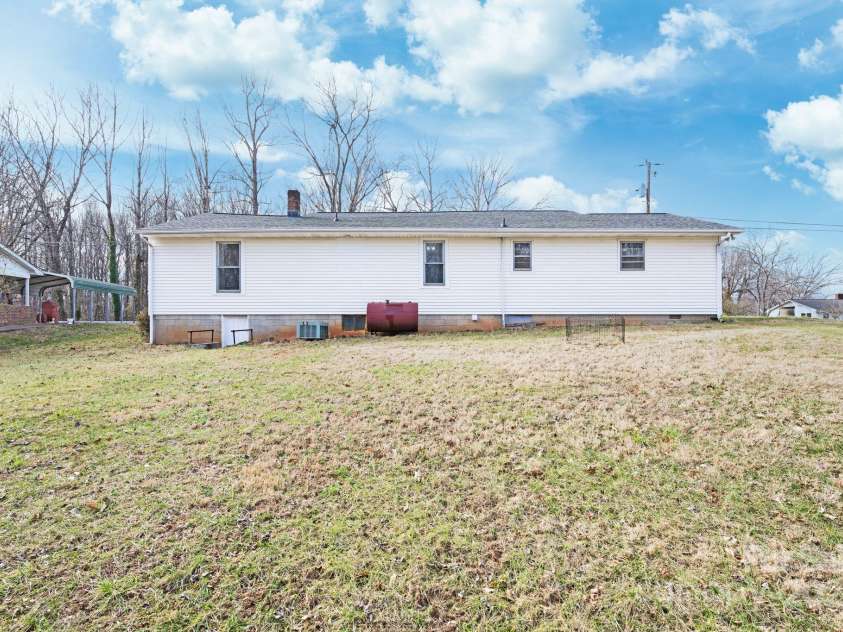 4036 Muncus Road, Jonesville, NC 28642.  MLS# CAR4223825, YatesRealty ID 20037. Back of Home