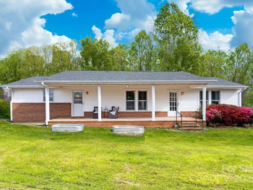 4036 Muncus Road, Jonesville, NC 28642.  MLS# CAR4223825, YatesRealty ID 20037. Huge covered porch!