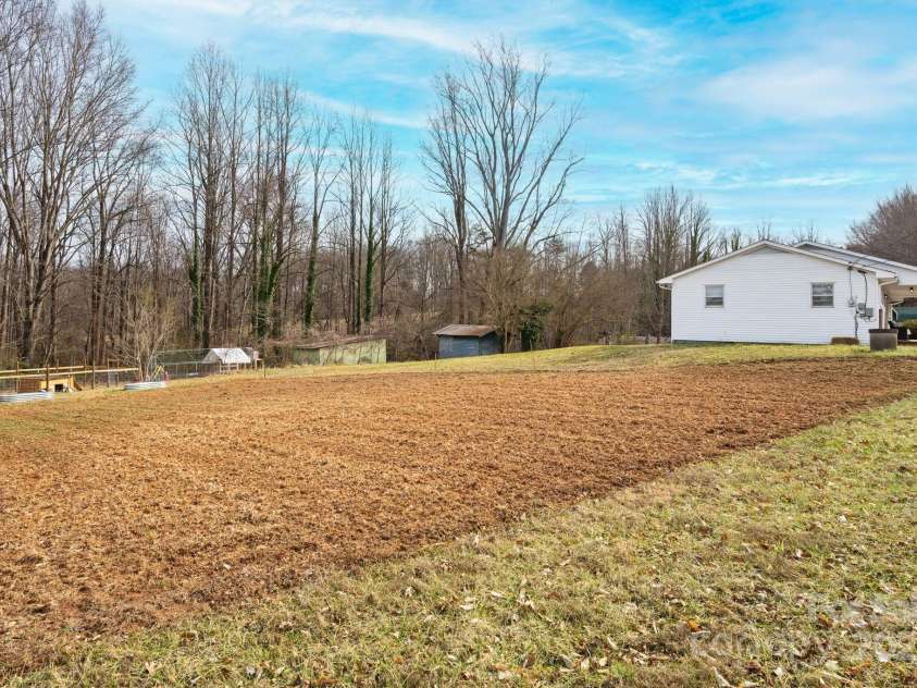 4036 Muncus Road, Jonesville, NC 28642.  MLS# CAR4223825, YatesRealty ID 20037. Large Garden