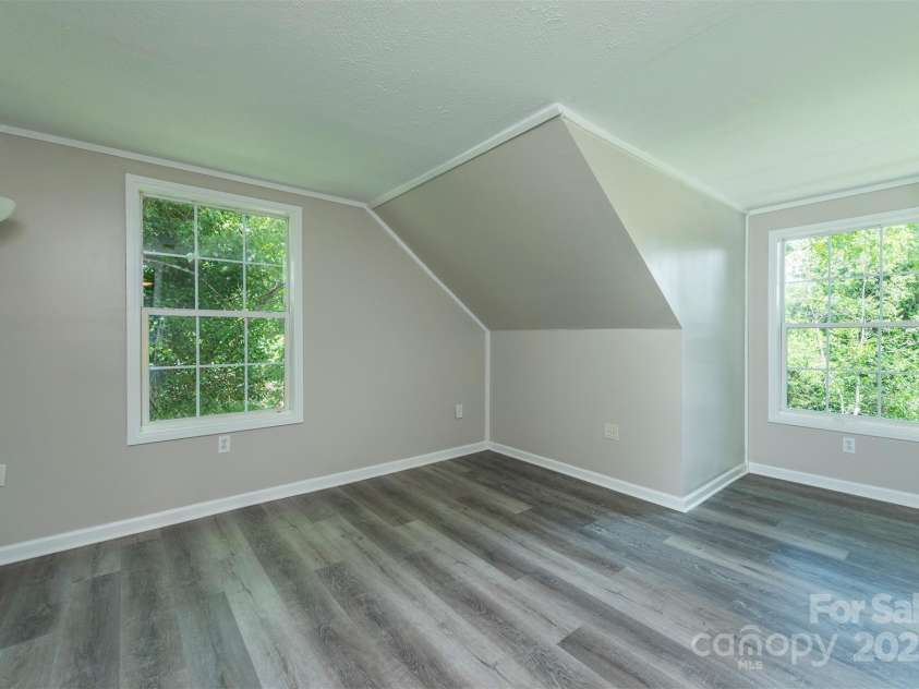 9 Everwood Drive, Candler, NC 28715.  MLS# CAR4269275, YatesRealty ID 20048. Bedroom upstairs