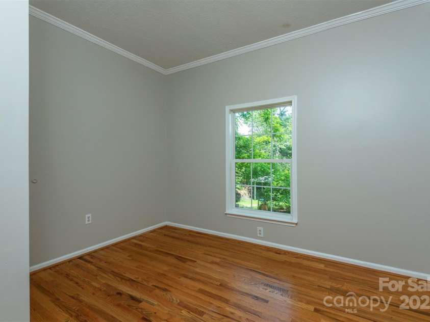 9 Everwood Drive, Candler, NC 28715.  MLS# CAR4269275, YatesRealty ID 20048. Downstairs bedroom #3