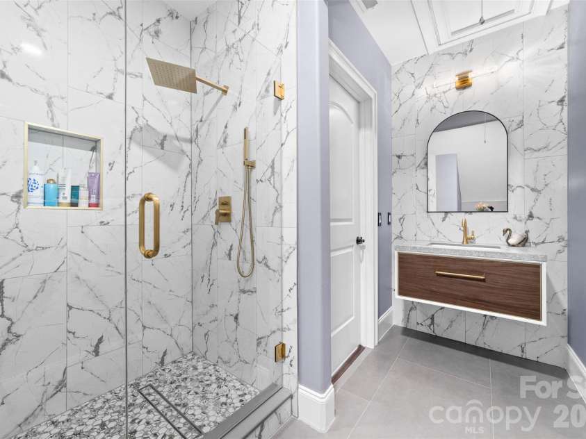 18805 Windy Point Drive, Cornelius, NC 28031.  MLS# CAR4373578, YatesRealty ID 20049. Each bedroom has its own updated bathroom