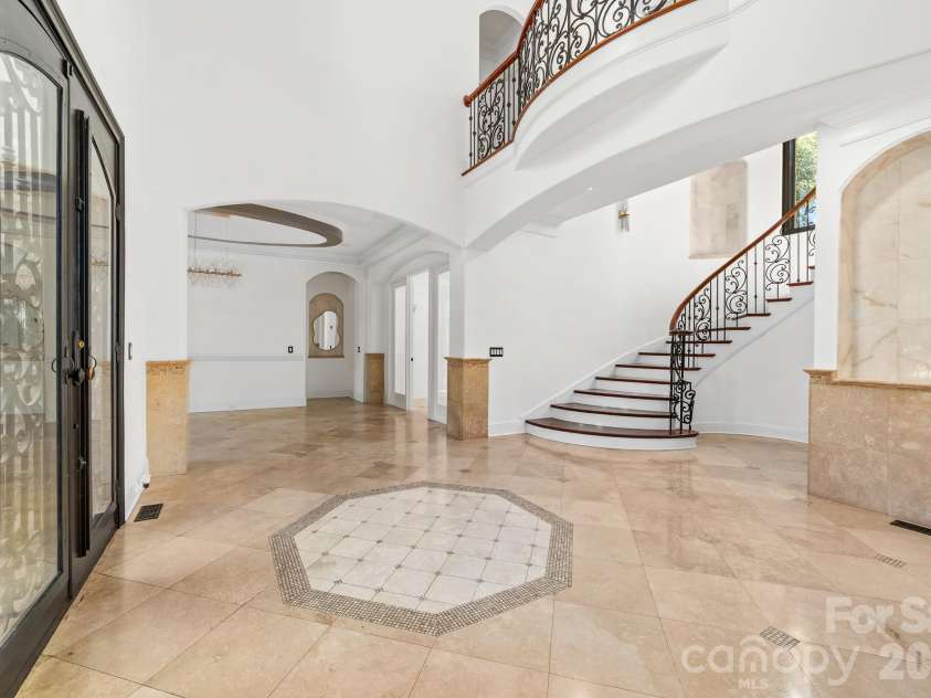 18805 Windy Point Drive, Cornelius, NC 28031.  MLS# CAR4373578, YatesRealty ID 20049. Grand front foyer