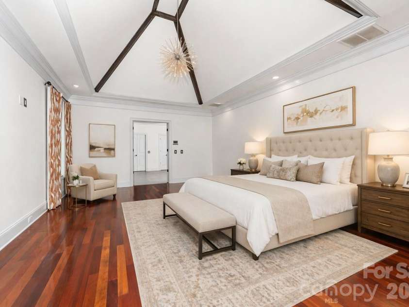 18805 Windy Point Drive, Cornelius, NC 28031.  MLS# CAR4373578, YatesRealty ID 20049. Virtually staged primary bedroom