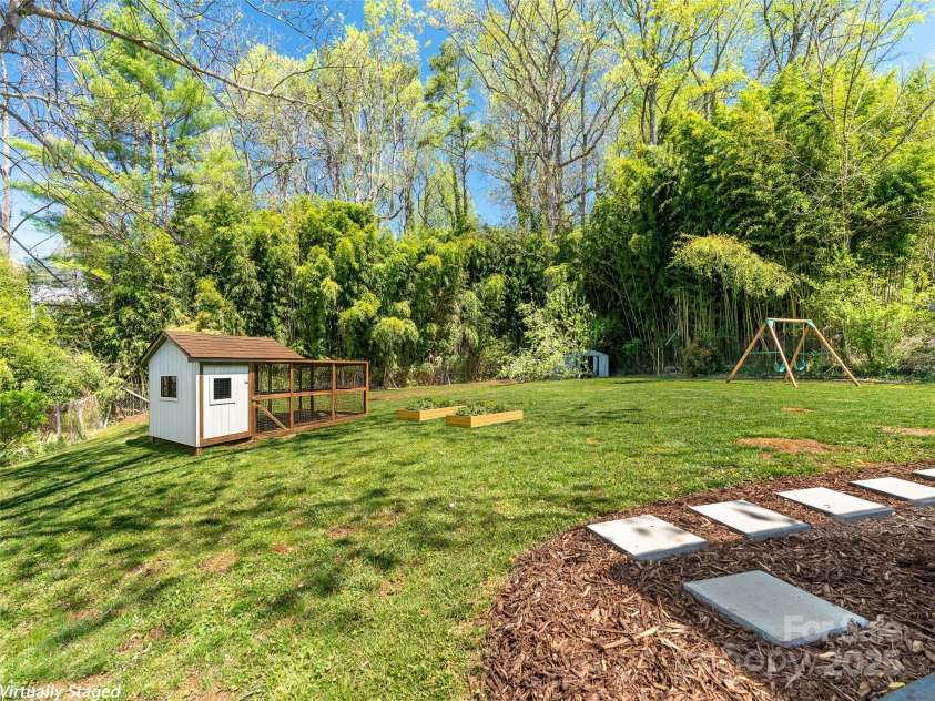 234 Monte Vista Road, Candler, NC 28715.  MLS# CAR4228633, YatesRealty ID 20050. Backyard with room to Grow! (virtually staged)
