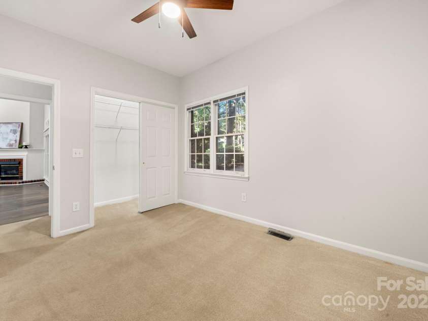 5550 Monticello Drive, Concord, NC 28027.  MLS# CAR4314212, YatesRealty ID 20051. Bedroom 2 w/lighted walk-in closet