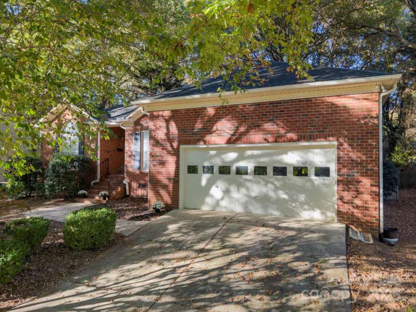 5550 Monticello Drive, Concord, NC 28027.  MLS# CAR4314212, YatesRealty ID 20051. Front view w/2-car attached garage
