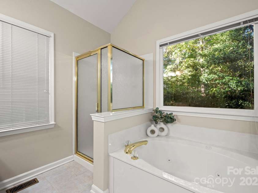 5550 Monticello Drive, Concord, NC 28027.  MLS# CAR4314212, YatesRealty ID 20051. Primary Bathroom