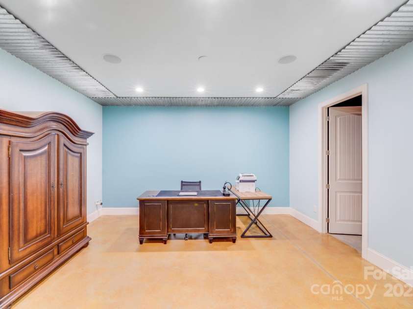 4071 King Wilkinson Road, Lincolnton, NC 28092.  MLS# CAR4241199, YatesRealty ID 20053. Flex room in basement with new barn door