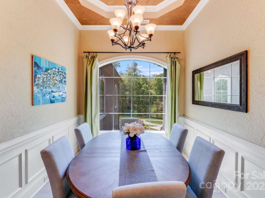 4071 King Wilkinson Road, Lincolnton, NC 28092.  MLS# CAR4241199, YatesRealty ID 20053. Formal dining area overlooks the large front yard.
