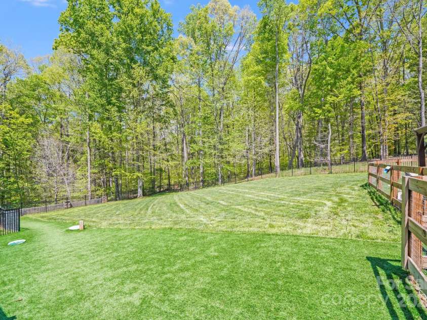 4071 King Wilkinson Road, Lincolnton, NC 28092.  MLS# CAR4241199, YatesRealty ID 20053. Gorgeous expansive back yard