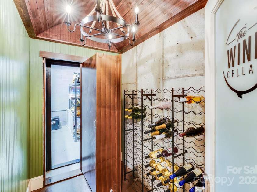 4071 King Wilkinson Road, Lincolnton, NC 28092.  MLS# CAR4241199, YatesRealty ID 20053. Wine Cellar with hidden safe room
