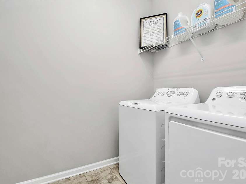 2225 Prairie Road, Concord, NC 28027.  MLS# CAR4337375, YatesRealty ID 20055. Main level laundry room