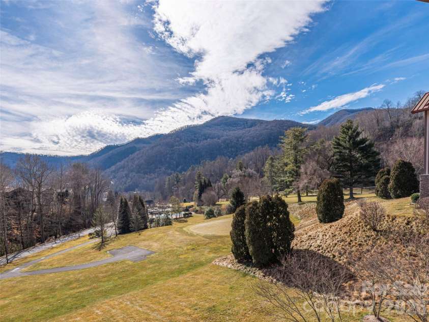 1650 Country Club Drive, Maggie Valley, NC 28751.  MLS# CAR4352647, YatesRealty ID 20059. Amazing SSE Mtn and course views