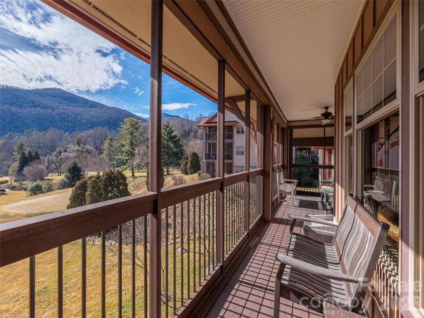 1650 Country Club Drive, Maggie Valley, NC 28751.  MLS# CAR4352647, YatesRealty ID 20059. Open porch