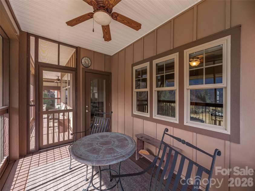 1650 Country Club Drive, Maggie Valley, NC 28751.  MLS# CAR4352647, YatesRealty ID 20059. Screened porch