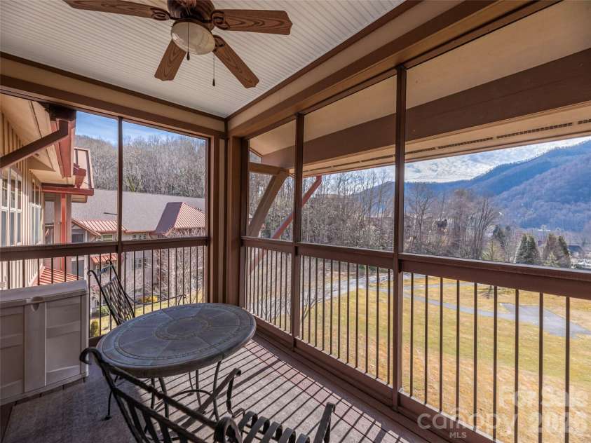1650 Country Club Drive, Maggie Valley, NC 28751.  MLS# CAR4352647, YatesRealty ID 20059. Screened porch