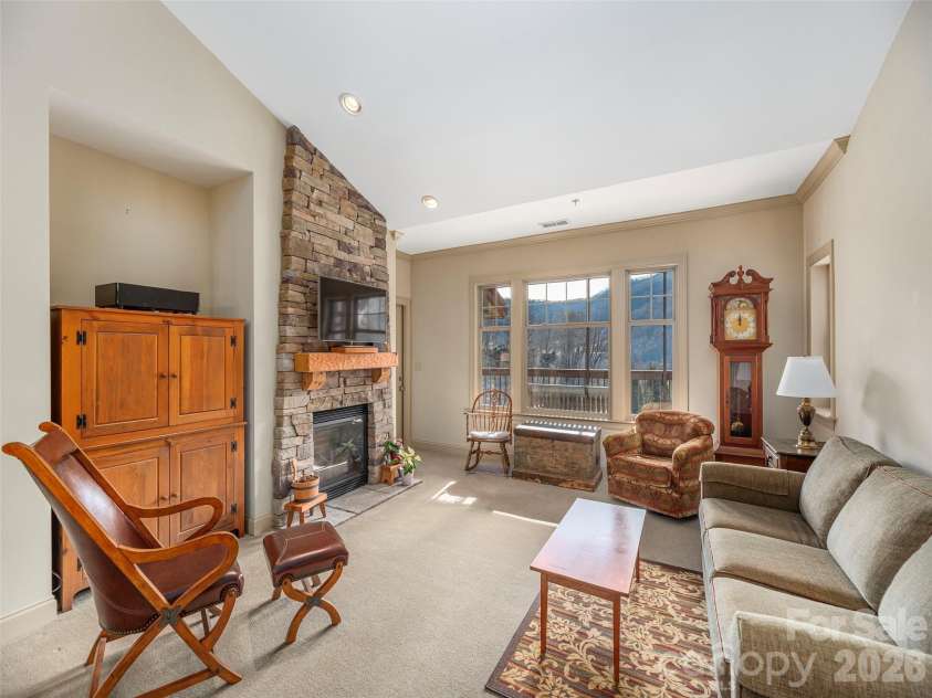 1650 Country Club Drive, Maggie Valley, NC 28751.  MLS# CAR4352647, YatesRealty ID 20059. Vented gas fireplace