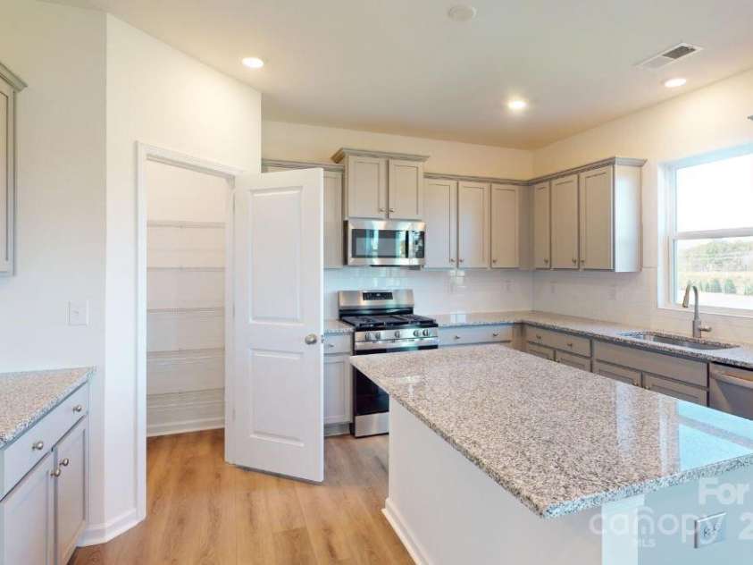 1813 Augustine Street, Monroe, NC 28112.  MLS# CAR4166145, YatesRealty ID 20059. Kitchen