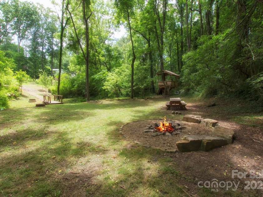 13 Orrinel Way, Asheville, NC 28806.  MLS# CAR4229136, YatesRealty ID 2006. Community Fire Pit