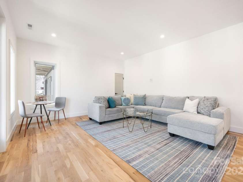 13 Orrinel Way, Asheville, NC 28806.  MLS# CAR4229136, YatesRealty ID 2006. Fully-Finished Basement with Second Living Room and Covered Deck Access