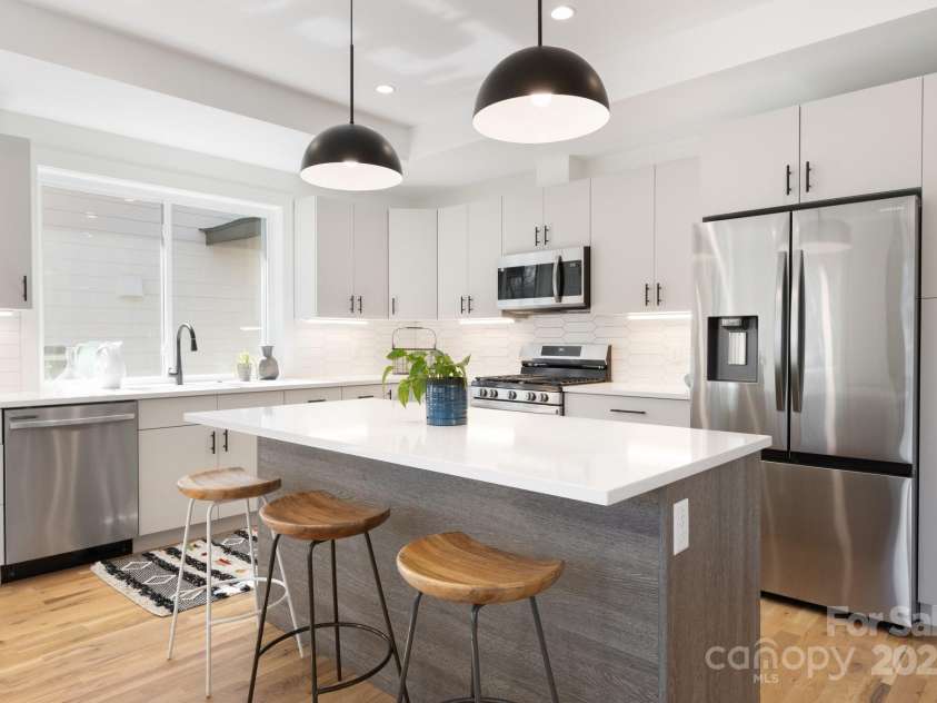 13 Orrinel Way, Asheville, NC 28806.  MLS# CAR4229136, YatesRealty ID 2006. Modern Chef's Kitchen Features Quartz and Stainless Steel