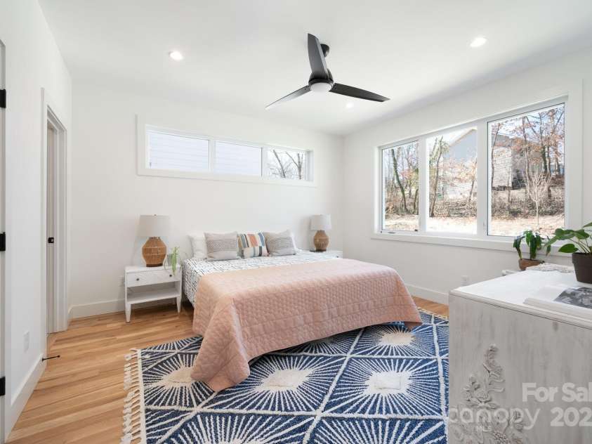 13 Orrinel Way, Asheville, NC 28806.  MLS# CAR4229136, YatesRealty ID 2006. Primary Suite Features a Clerestory Window and Modern Ceiling Fan