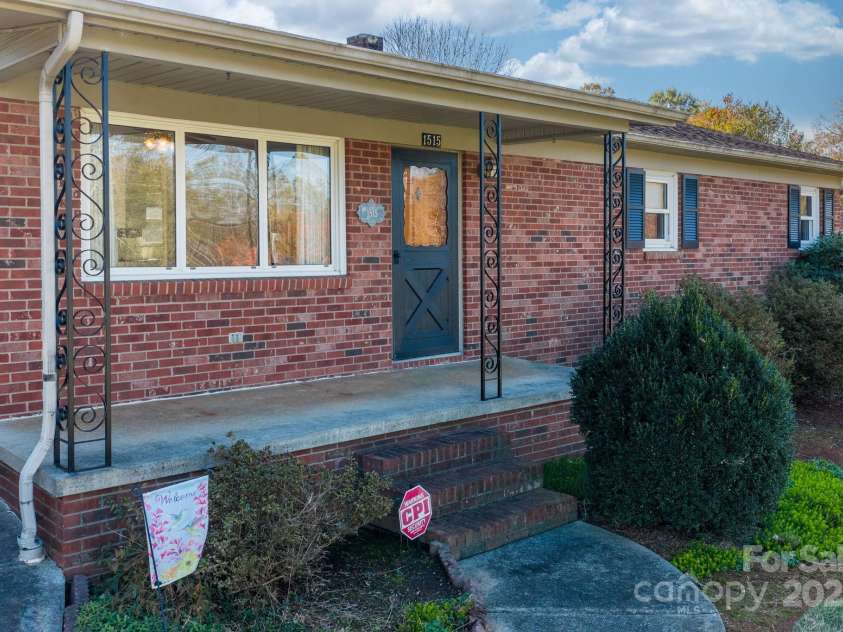 1515 Fairway Acres Road, Lenoir, NC 28645.  MLS# CAR4319002, YatesRealty ID 20064. Front porch walkway