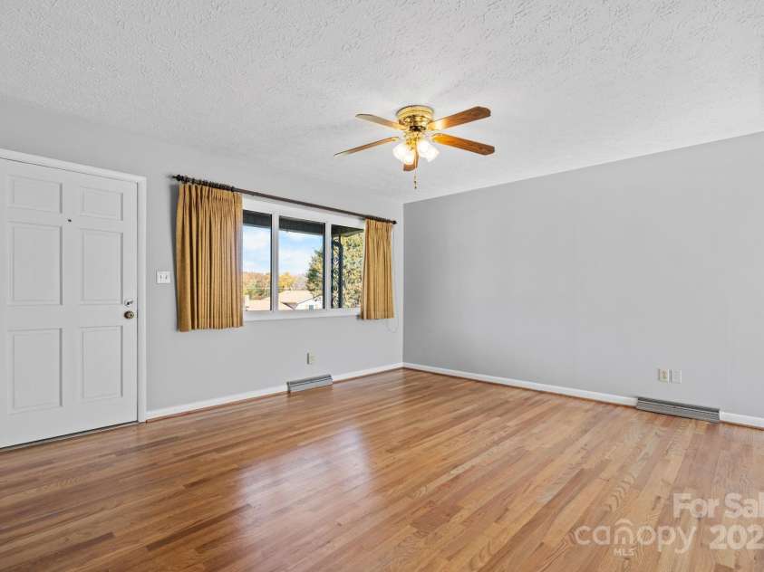 1515 Fairway Acres Road, Lenoir, NC 28645.  MLS# CAR4319002, YatesRealty ID 20064. Living room