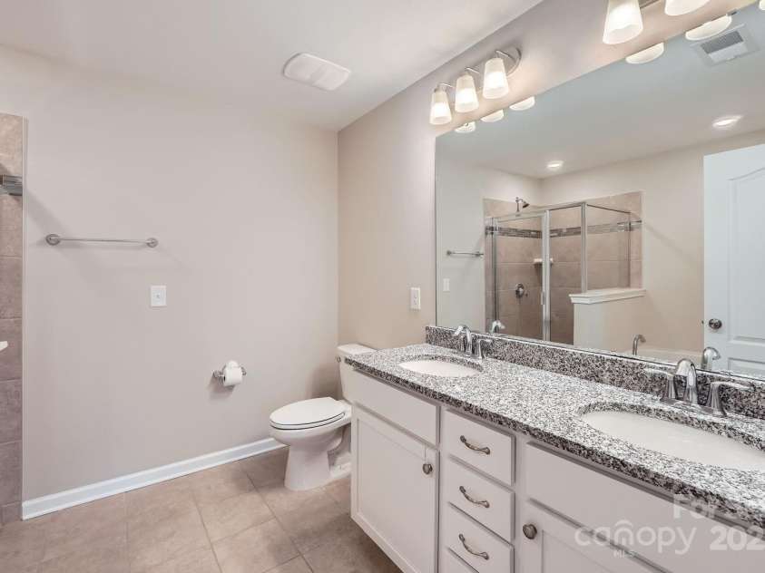 19812 Elise Caroline Alley, Davidson, NC 28036.  MLS# CAR4259405, YatesRealty ID 20069. Dual sink vanity