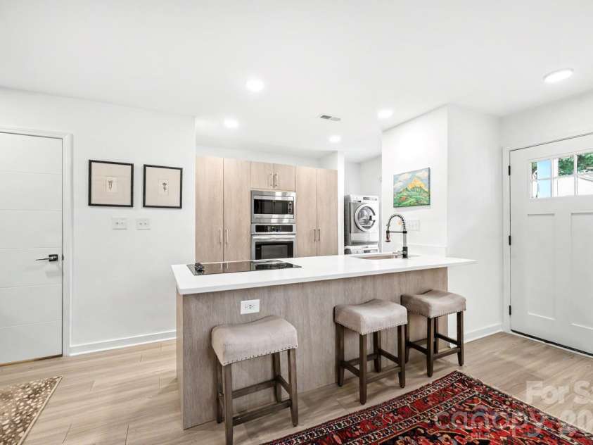 1511 Briar Creek Road, Charlotte, NC 28205.  MLS# CAR4372907, YatesRealty ID 20075. Bar seating