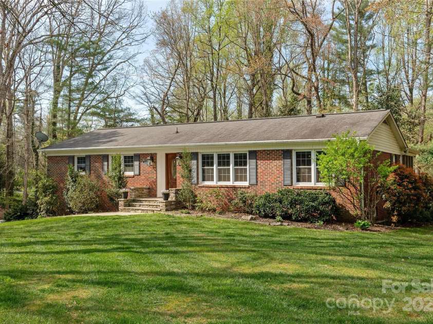 215 Shannon Road, Hendersonville, NC 28791.  MLS# CAR4246696, YatesRealty ID 20077. 