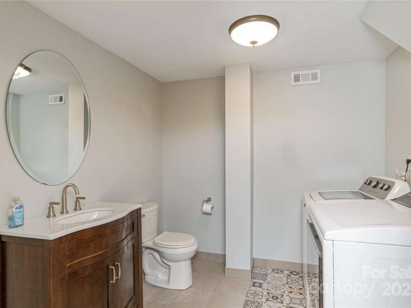 215 Shannon Road, Hendersonville, NC 28791.  MLS# CAR4246696, YatesRealty ID 20077. 