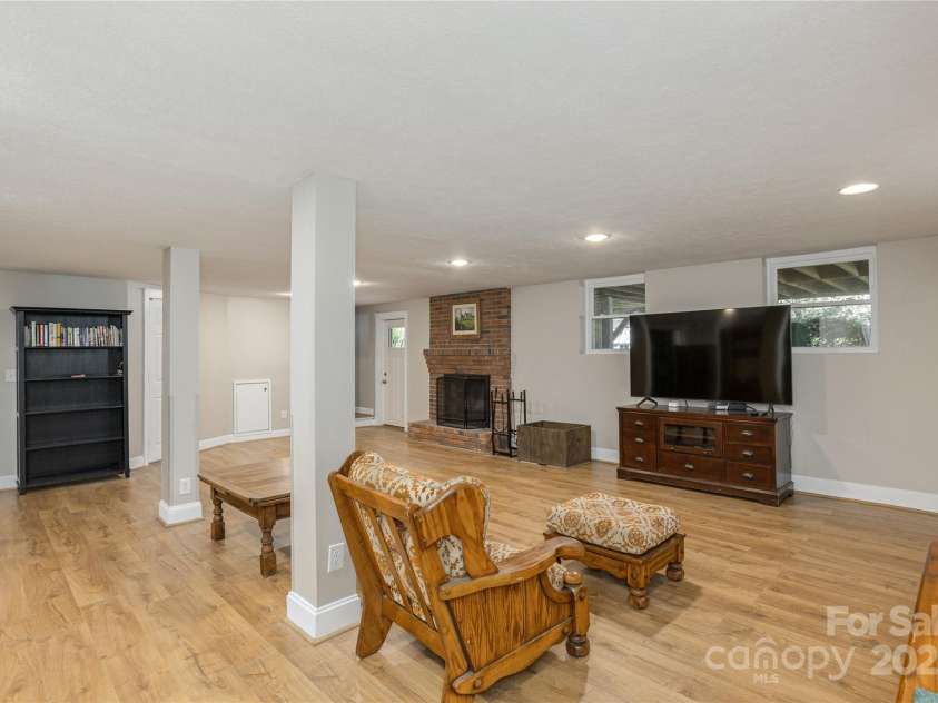 215 Shannon Road, Hendersonville, NC 28791.  MLS# CAR4246696, YatesRealty ID 20077. Backyard access from basement