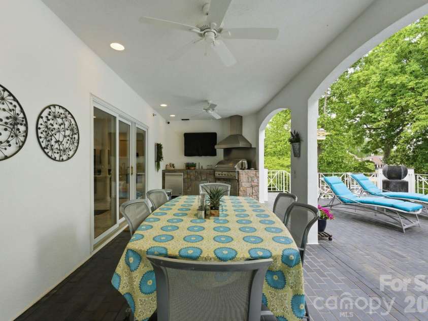 18426 Peninsula Cove Lane, Cornelius, NC 28031.  MLS# CAR4375387, YatesRealty ID 20078. Lower level covered porch area.