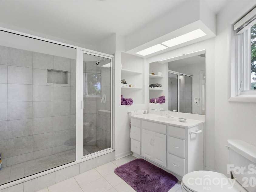 18426 Peninsula Cove Lane, Cornelius, NC 28031.  MLS# CAR4375387, YatesRealty ID 20078. Lower level full bath