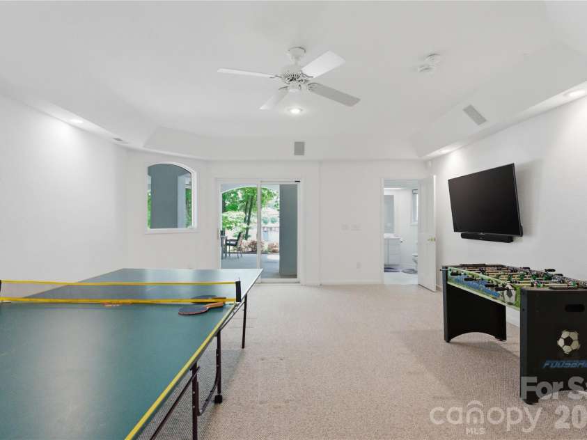 18426 Peninsula Cove Lane, Cornelius, NC 28031.  MLS# CAR4375387, YatesRealty ID 20078. Lower level game area