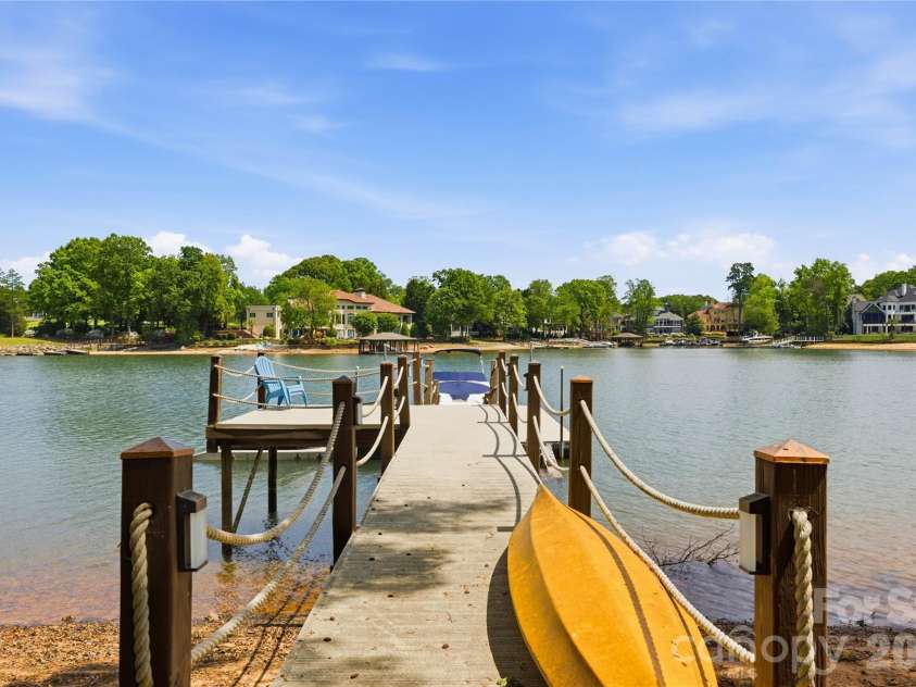 18426 Peninsula Cove Lane, Cornelius, NC 28031.  MLS# CAR4375387, YatesRealty ID 20078. Private floating dock with 6000# lift