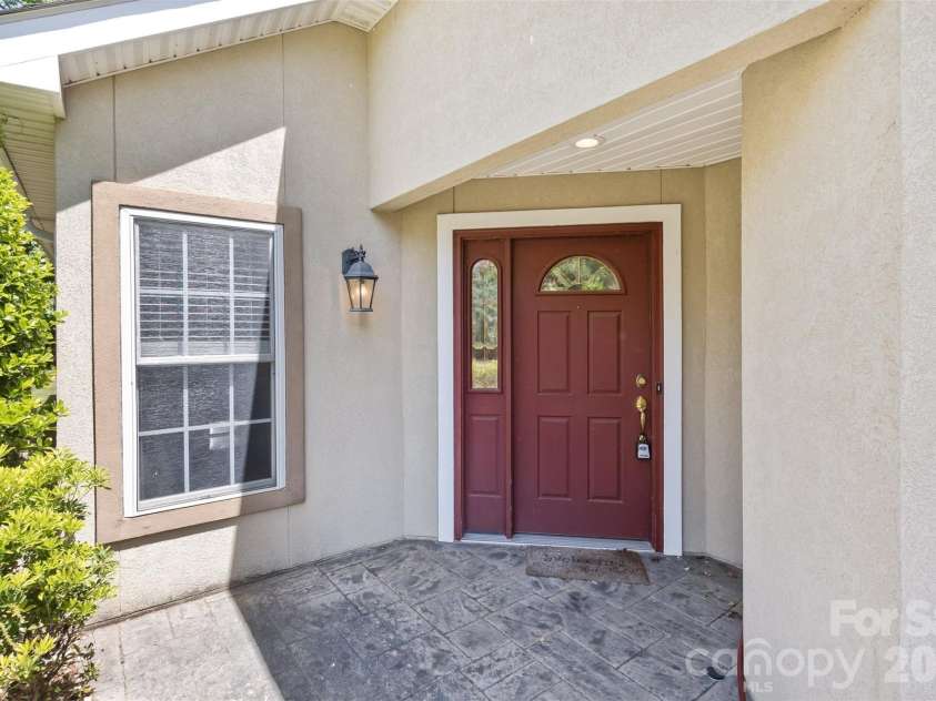 55 Stonebridge Drive, Asheville, NC 28805.  MLS# CAR4379940, YatesRealty ID 20084. Covered side entry.