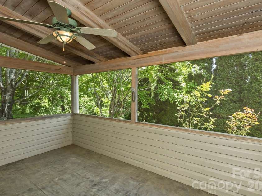 55 Stonebridge Drive, Asheville, NC 28805.  MLS# CAR4379940, YatesRealty ID 20084. Shaded, private and has a ceiling fan.
