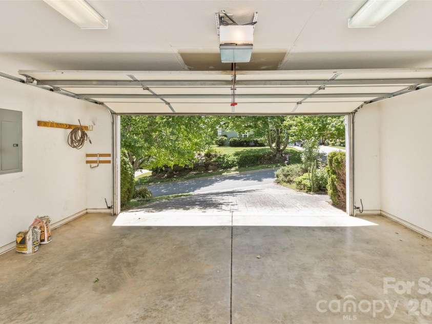 55 Stonebridge Drive, Asheville, NC 28805.  MLS# CAR4379940, YatesRealty ID 20084. Spacious 2 car garage.