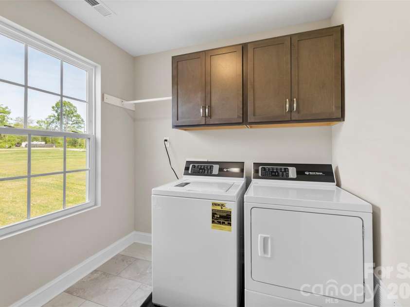 5713 Rehobeth Road, Waxhaw, NC 28173.  MLS# CAR4366678, YatesRealty ID 20086. Upstairs laundry room