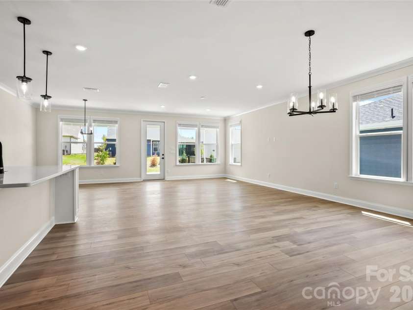 2720 Peak Court, Belmont, NC 28012.  MLS# CAR4331686, YatesRealty ID 20087. Large windows overlooking covered patio