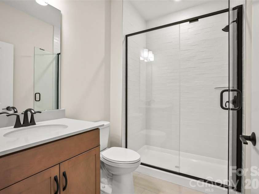 2720 Peak Court, Belmont, NC 28012.  MLS# CAR4331686, YatesRealty ID 20087. ...With shared bathroom featuring walk-in shower