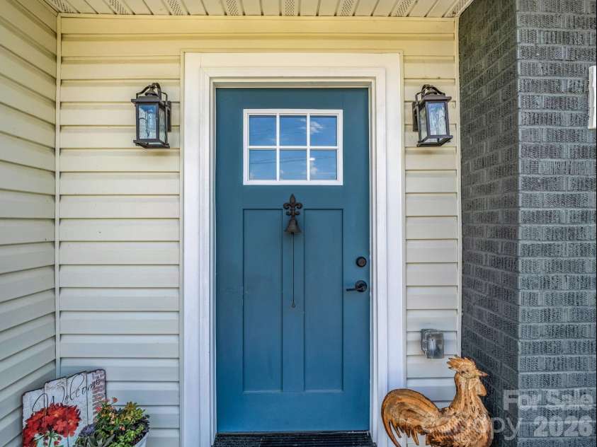 156 Dobbinsville Extension, Ellenboro, NC 28040.  MLS# CAR4379595, YatesRealty ID 20088. Front door