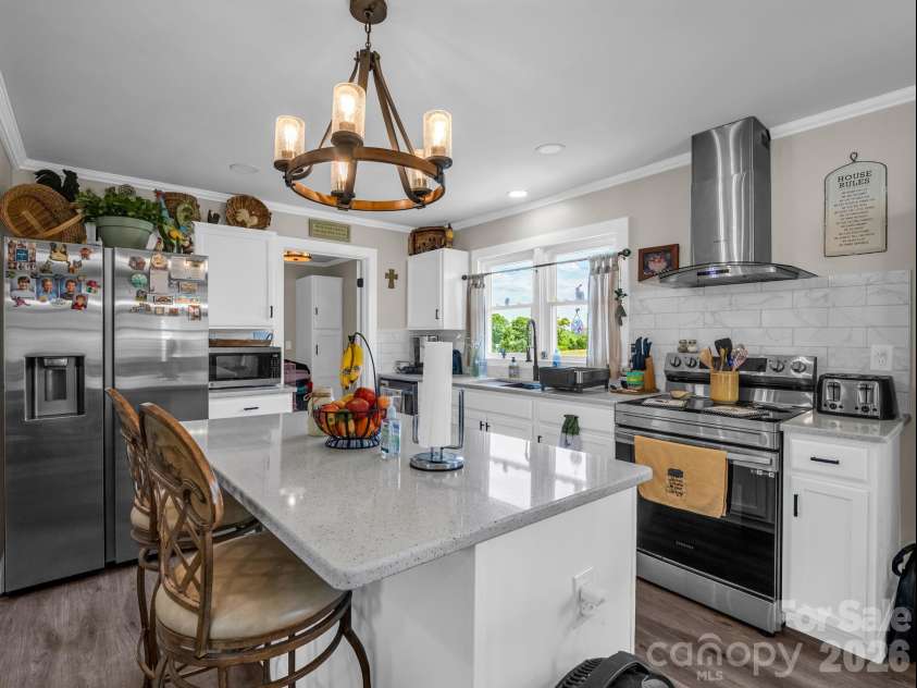 156 Dobbinsville Extension, Ellenboro, NC 28040.  MLS# CAR4379595, YatesRealty ID 20088. Island bar in kitchen
