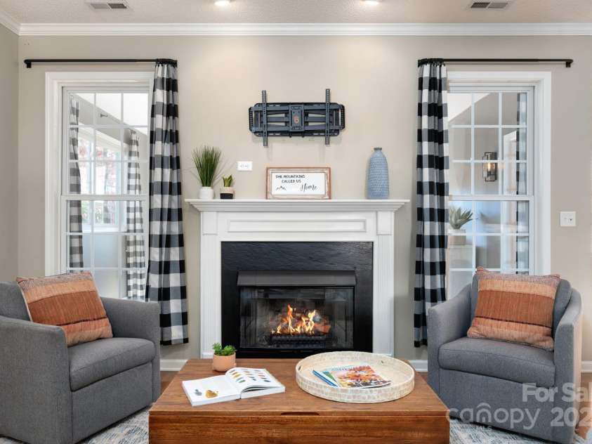 207 Farm Creek Drive, Asheville, NC 28806.  MLS# CAR4320360, YatesRealty ID 20088. Cozy gas logs set the mood.