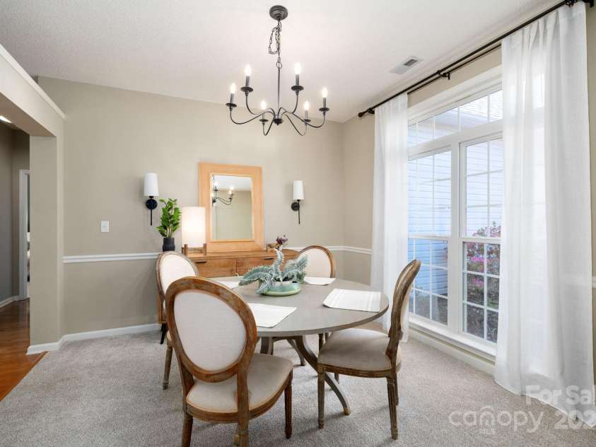 207 Farm Creek Drive, Asheville, NC 28806.  MLS# CAR4320360, YatesRealty ID 20088. Great gathering spot for festive meals.