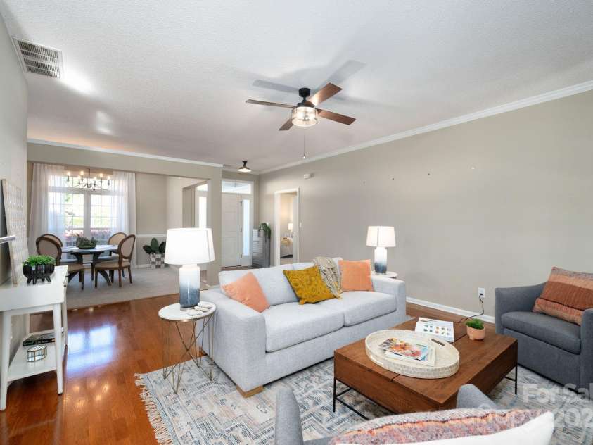 207 Farm Creek Drive, Asheville, NC 28806.  MLS# CAR4320360, YatesRealty ID 20088. Living room connects to both dining and kitchen.